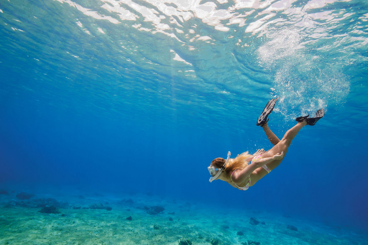 Mexico Cozumel Woman Snorkeling and Swimming