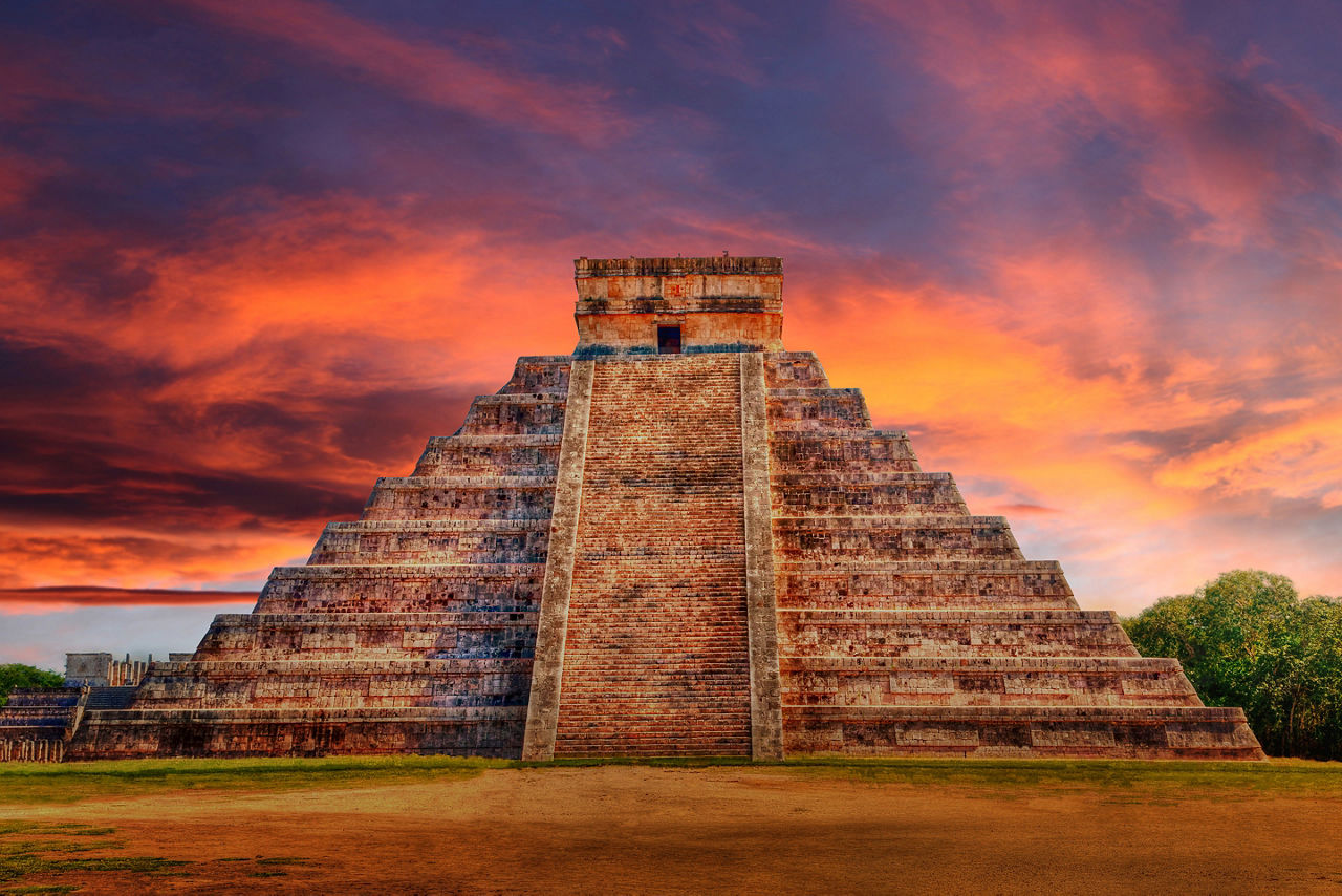 Go to the Kukulcan Pyramid at the Chichen Itza in Mexico