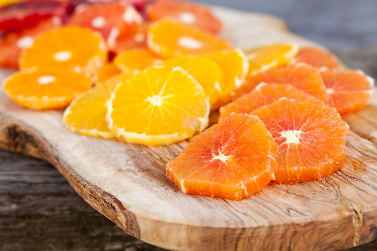 Sliced Fresh Oranges on Cutting Board