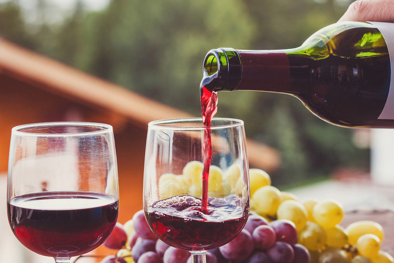 Red Wine Bottle Being Poured 