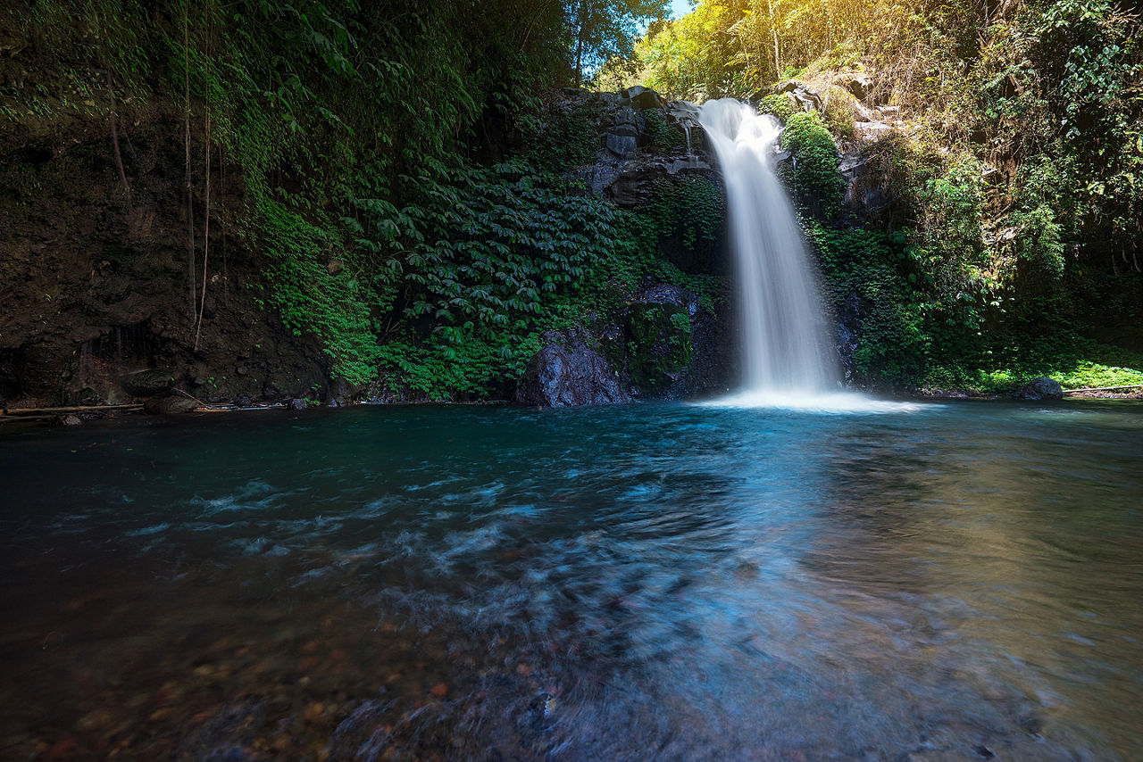 Gitgit waterfalls, famous attraction in Bali, Indonesia.