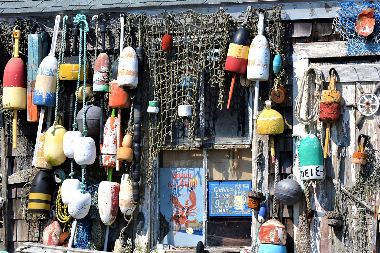 Collection of Vintage Buoys in Fishing Village