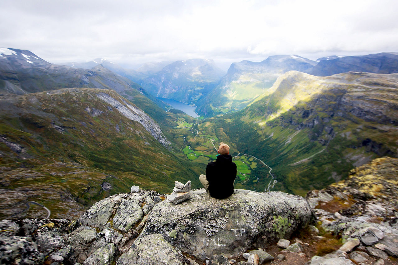 Classic summer picture of norwegian valley and fjord Geirangerfjord