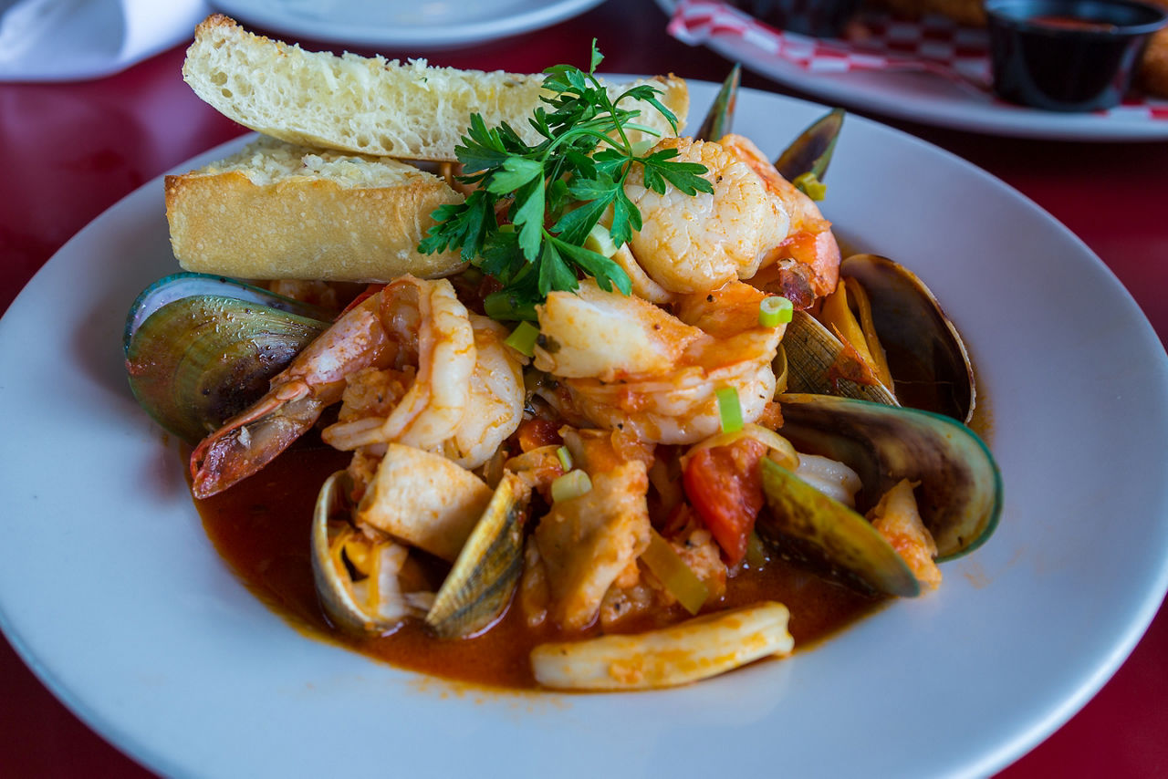 Shrimps, mussels and squid decorated with parsley. Monterey, California