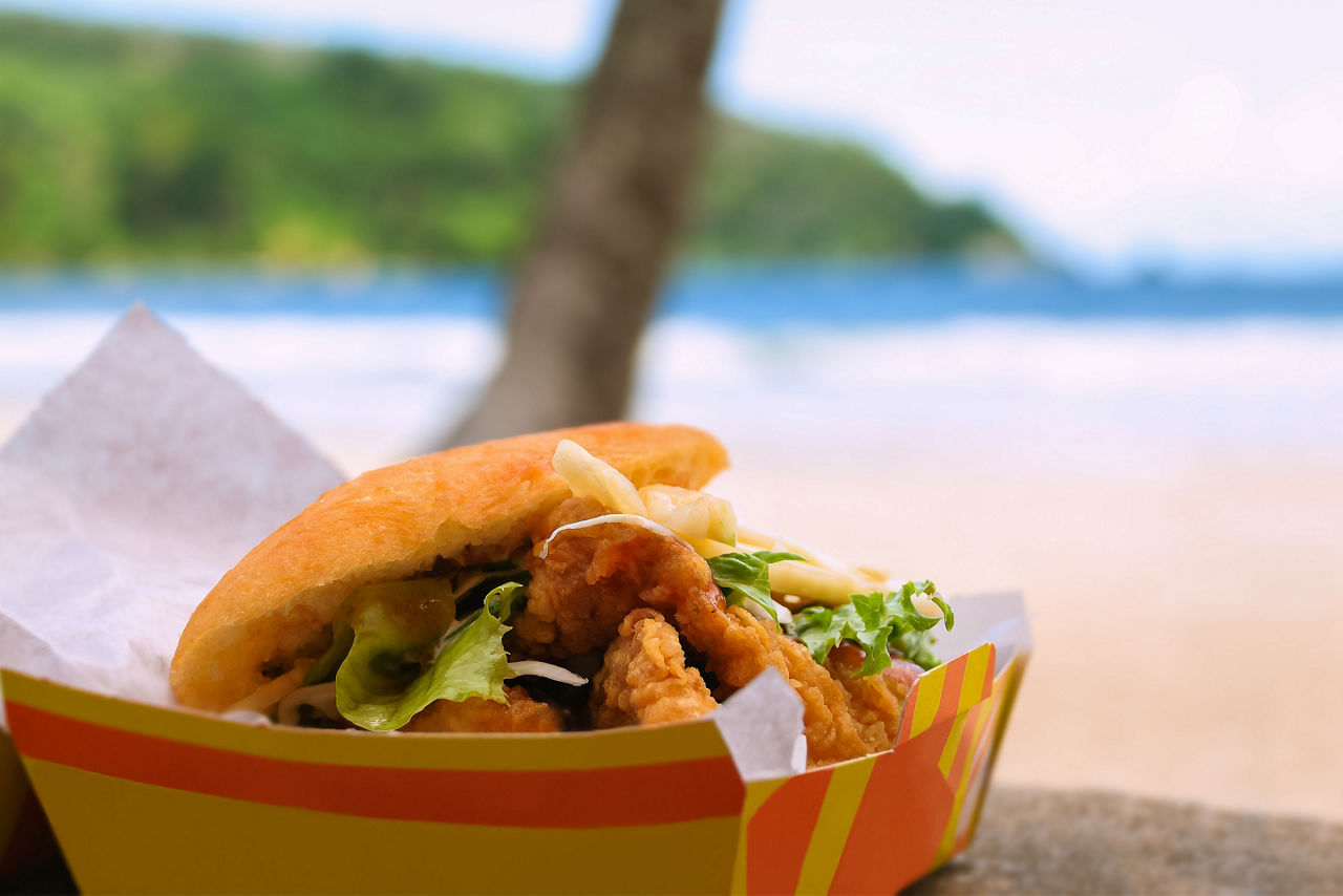 Fried shark and bake fast food by the beach at Maracas Bay