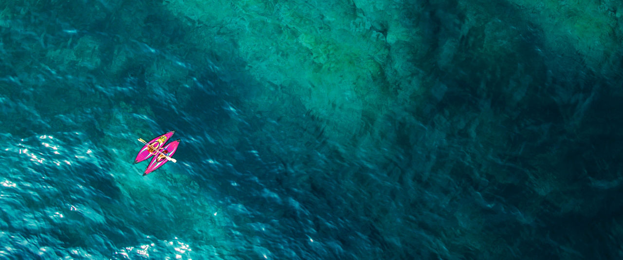 Aerial View of couple kayaking in Kings Wharf, Bermuda | HP