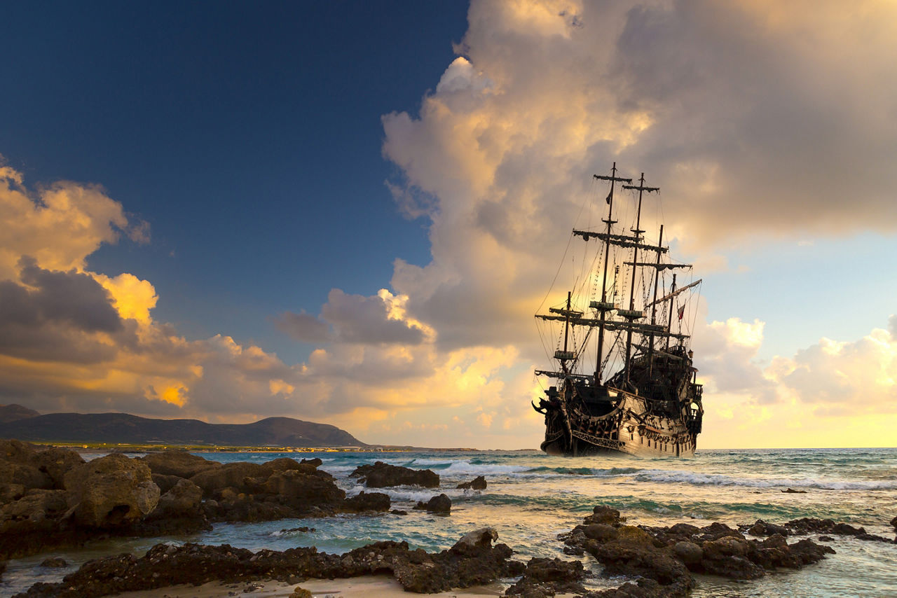 Pirate ship sailing into the sunset. Transatlantic.