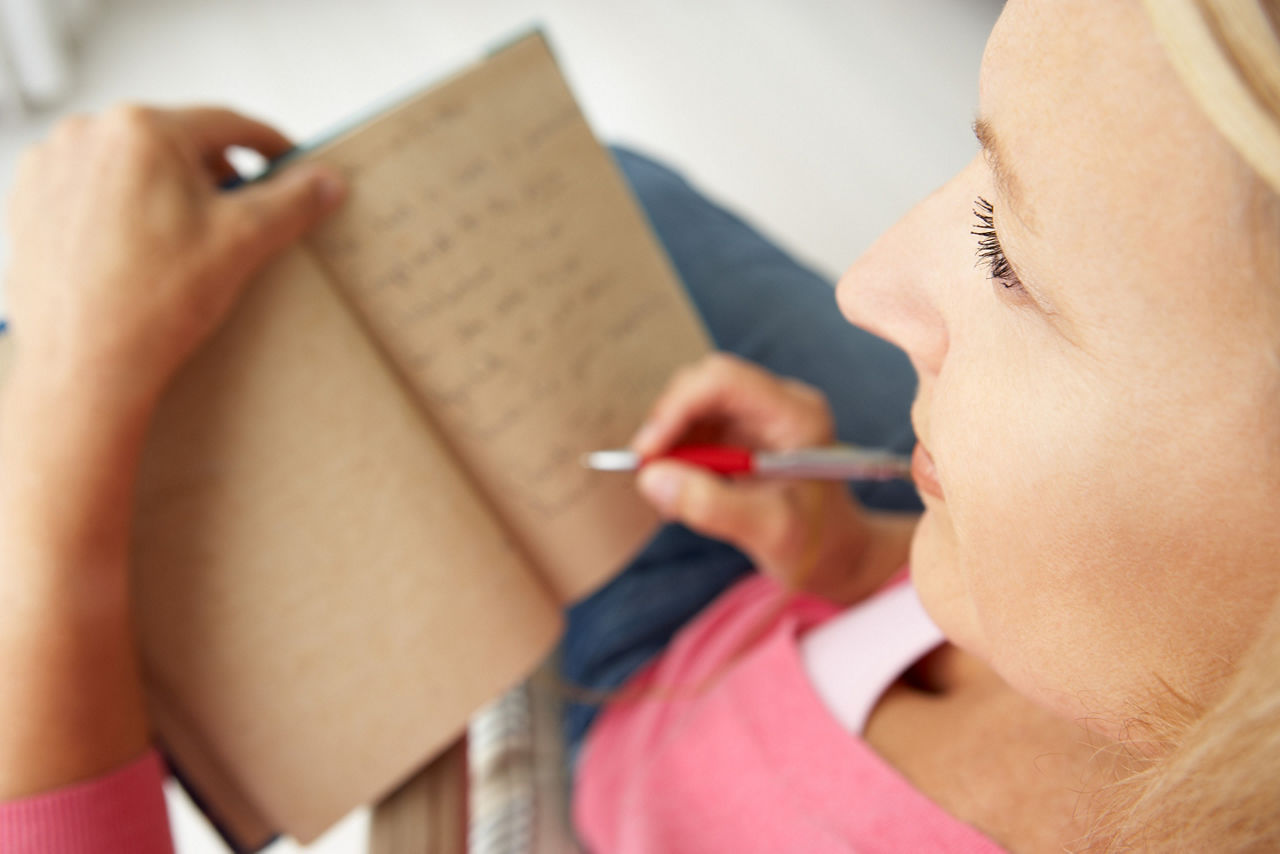 Woman Journaling on a Cruise