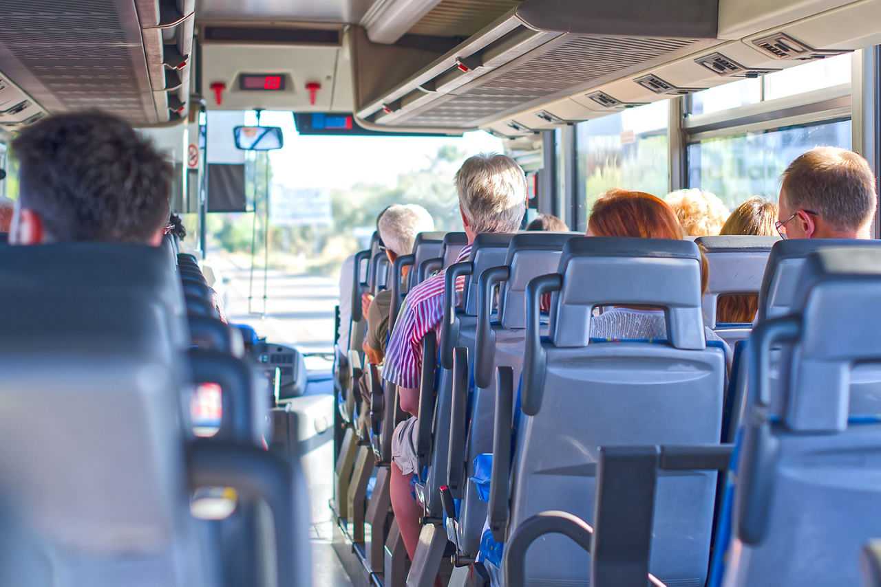 Passengers Taking Bus Route to Cruise Ship