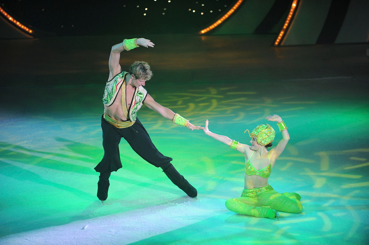 Couple dressed like genies dancing in ice skating show Ice Under the Big Top.