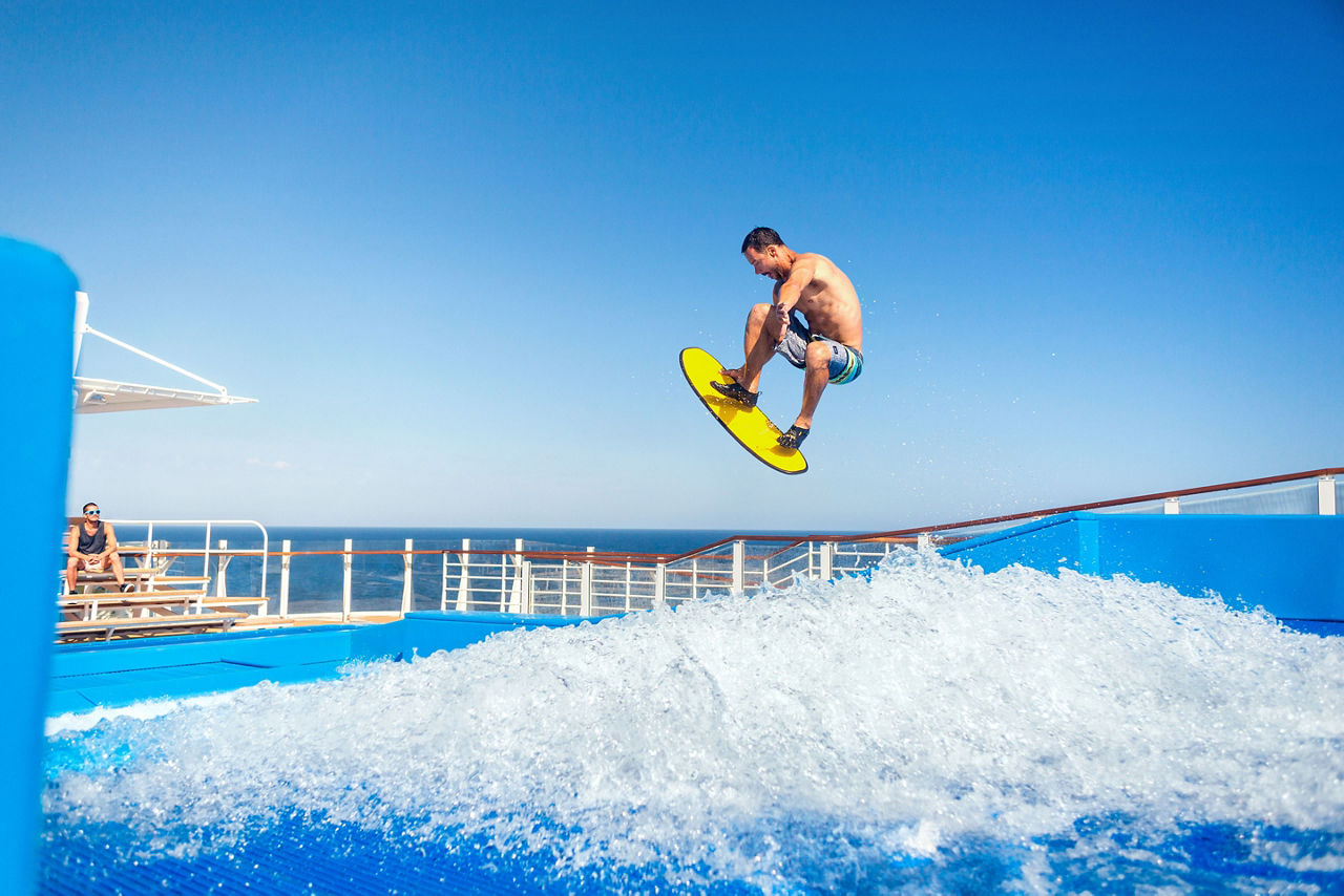 Man Doing Air Trick on Flowrider 