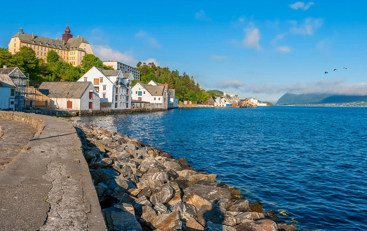 Rocks lining the sea wall in Alesund, Norway