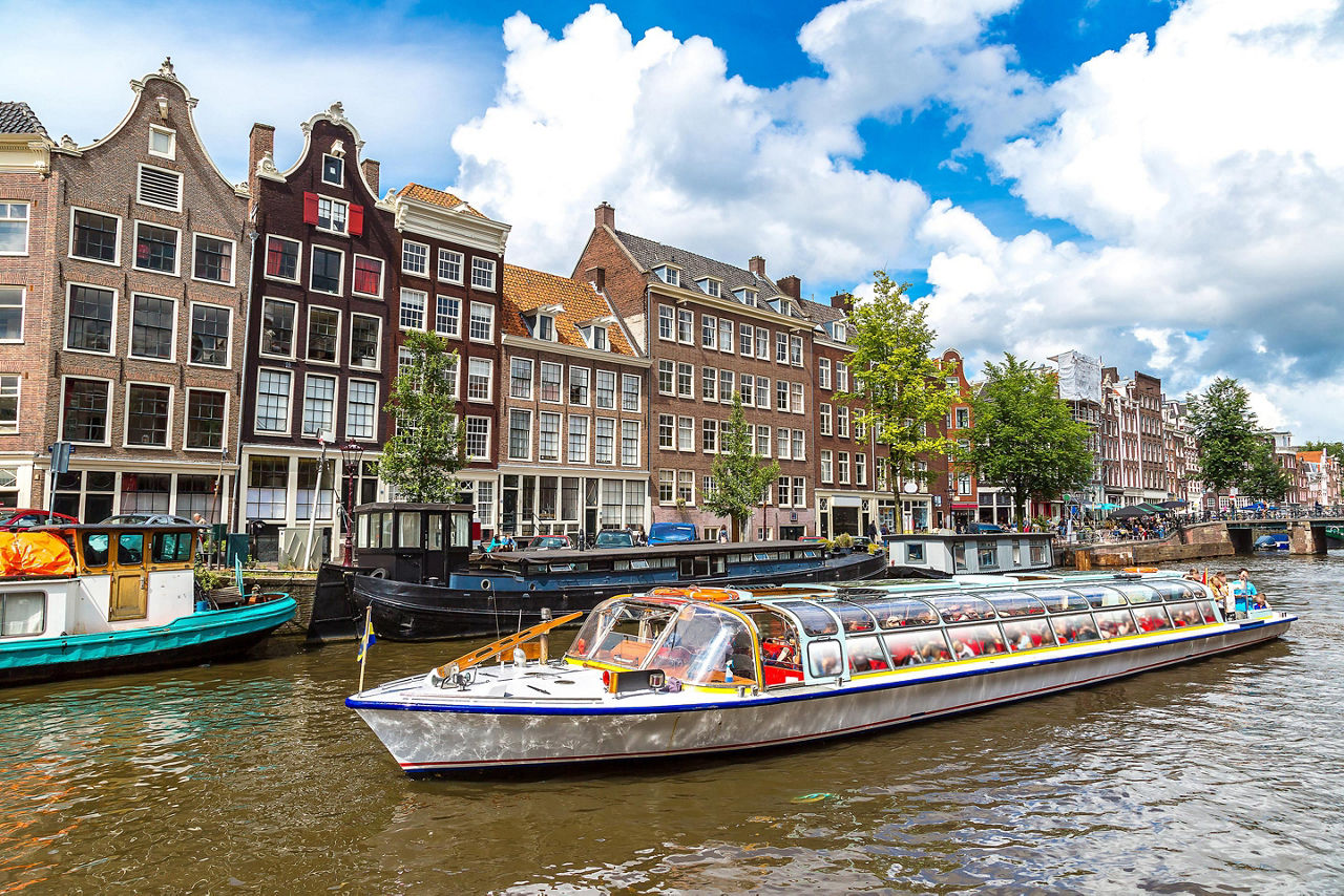 Glass top boat ride along the canals of Amsterdam, Netherlands