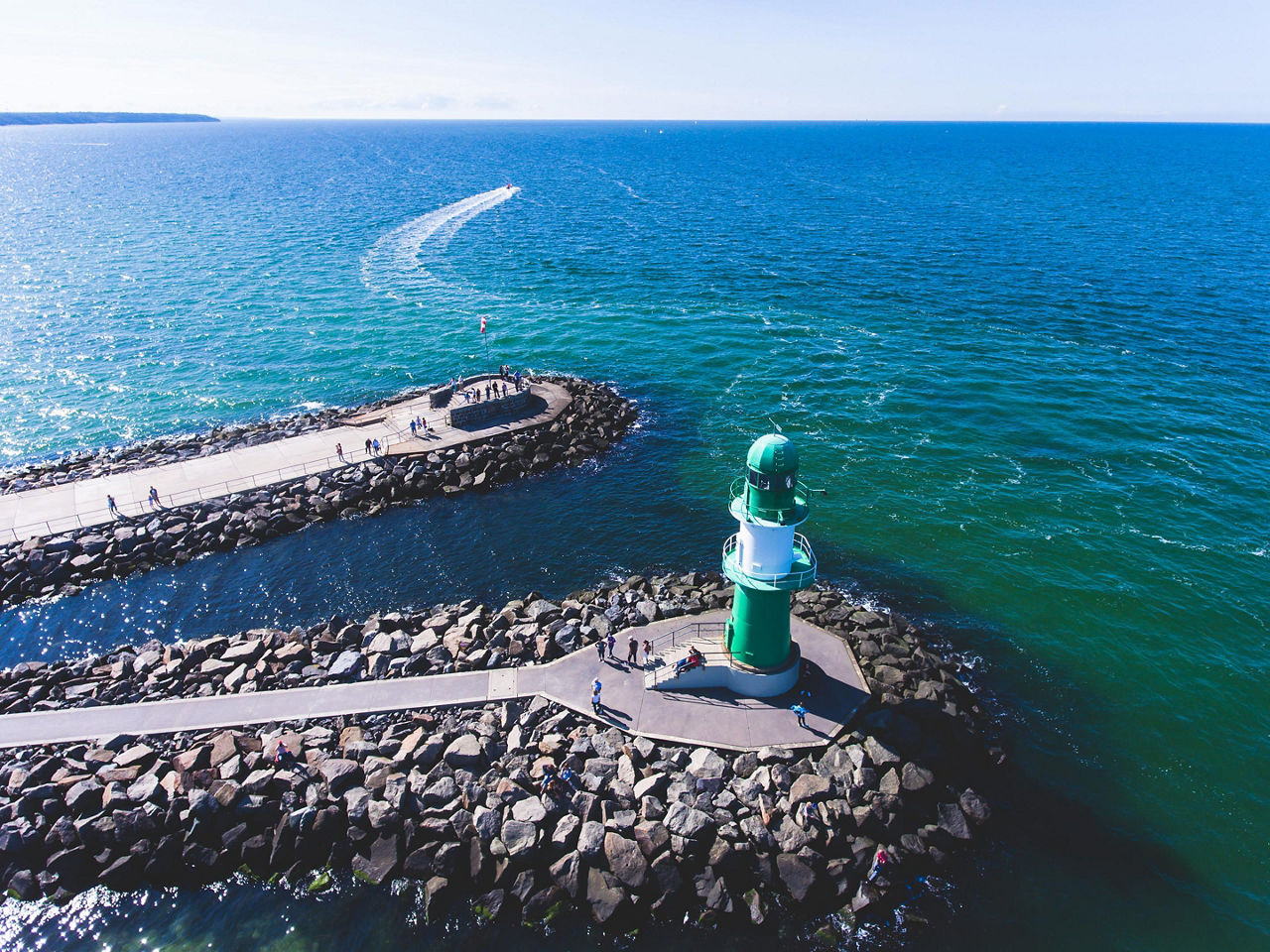 A Green Coastal Lighthouse in Rostock, Berlin (Rostock), Germany