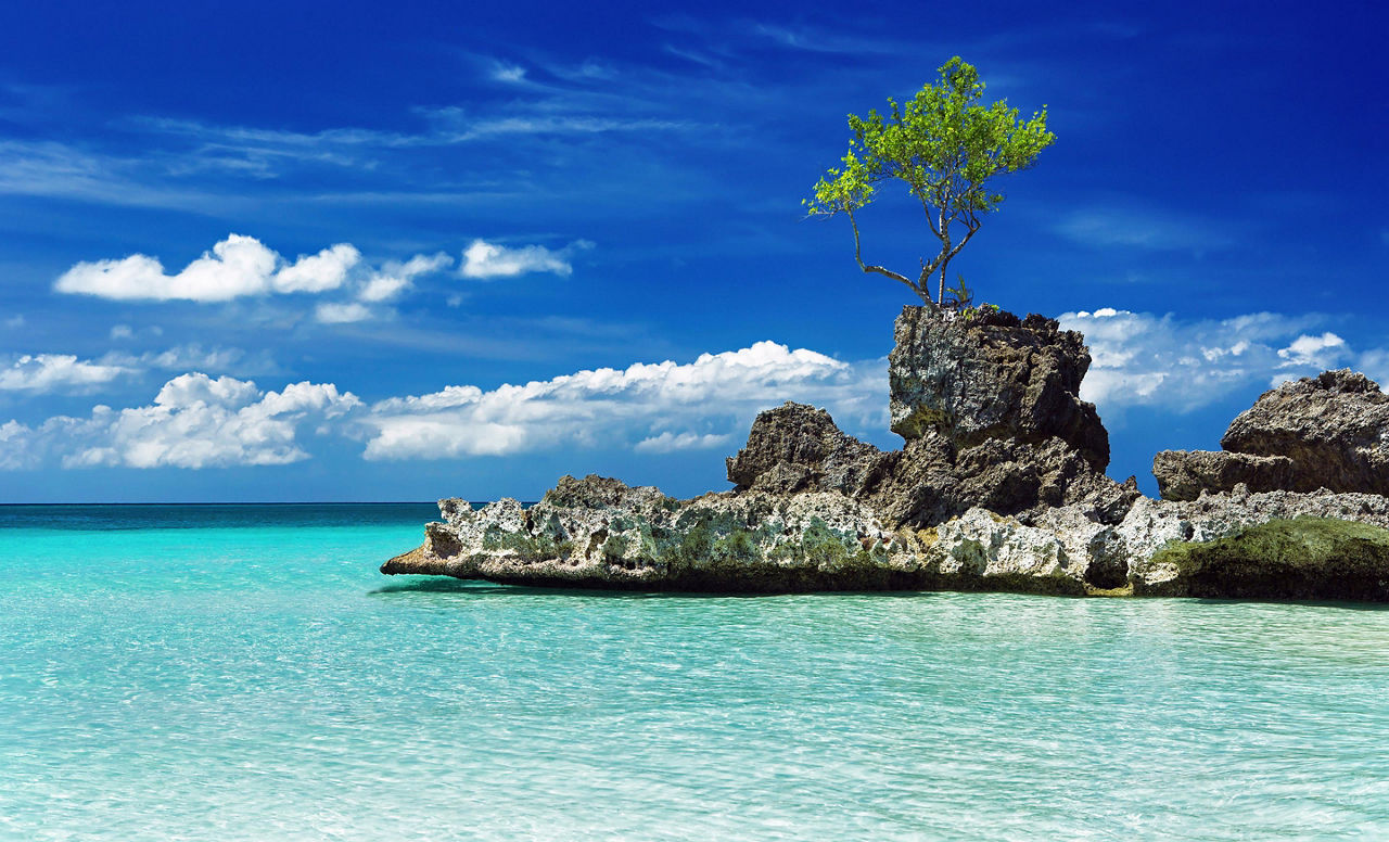 Willy's rock on the beach on Boracay Island, Philippines