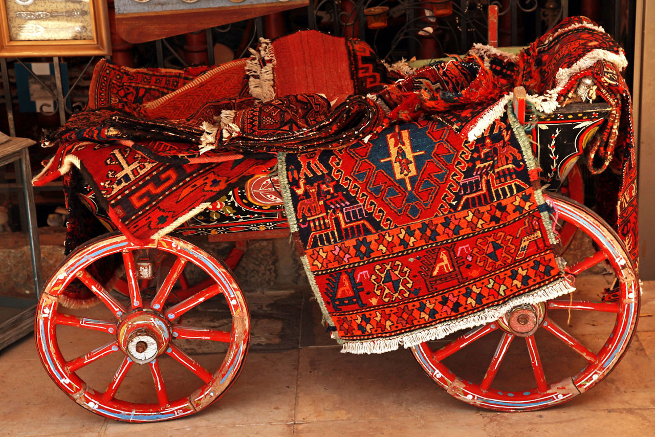 Homemade carpets on a cart