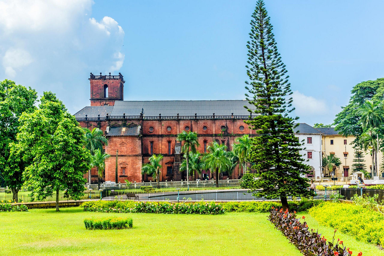 Basilica of Bom jesus in Old Goa inspired by Portuguese architecture with lush landscape in Goa, India