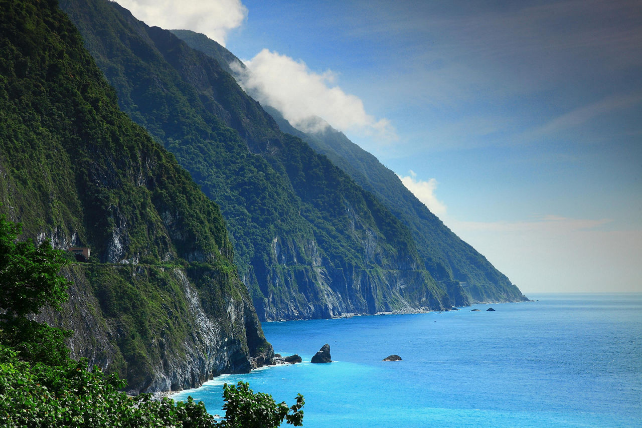 Beautiful mountainside cliff with clear blue waters in Hualien, Taiwan