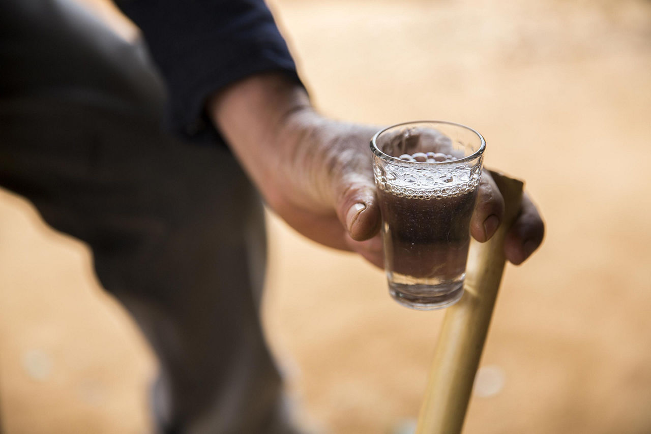 A cup of mezcal, a local alcohol in Huatulco, Mexico 