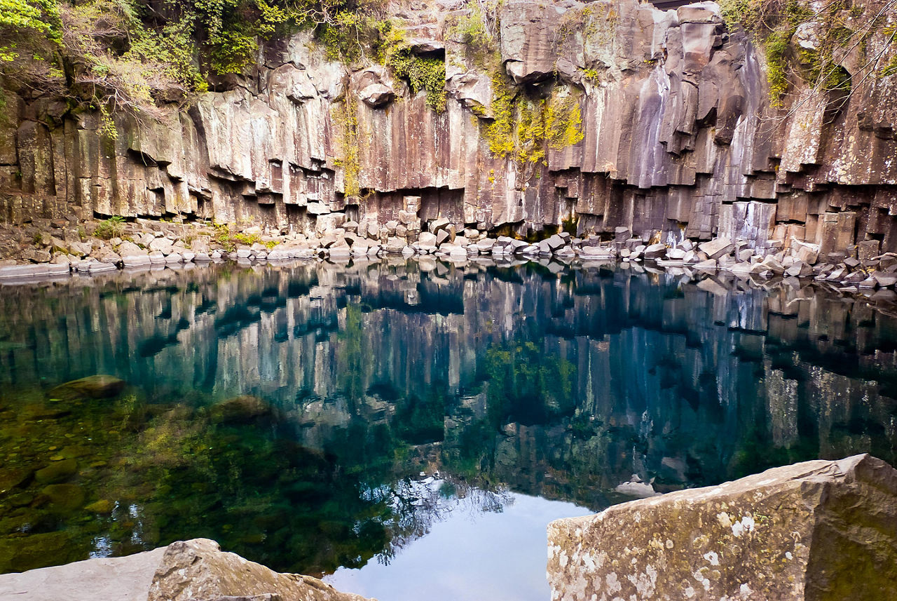 Pond of famous Cheonjiyeon Falls on Jeju Island of South Korea