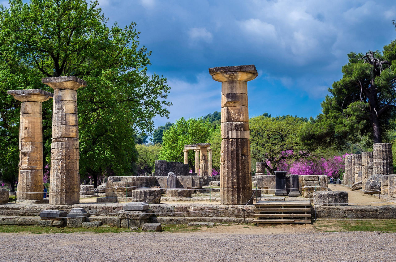 Multiple ruins of ancient Greek pillars in Olympia