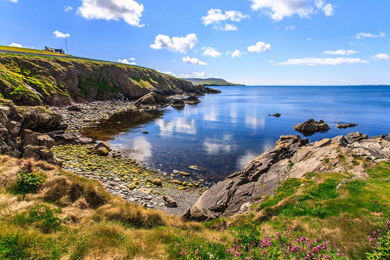 Coast terrain and a secluded bay in Scotland