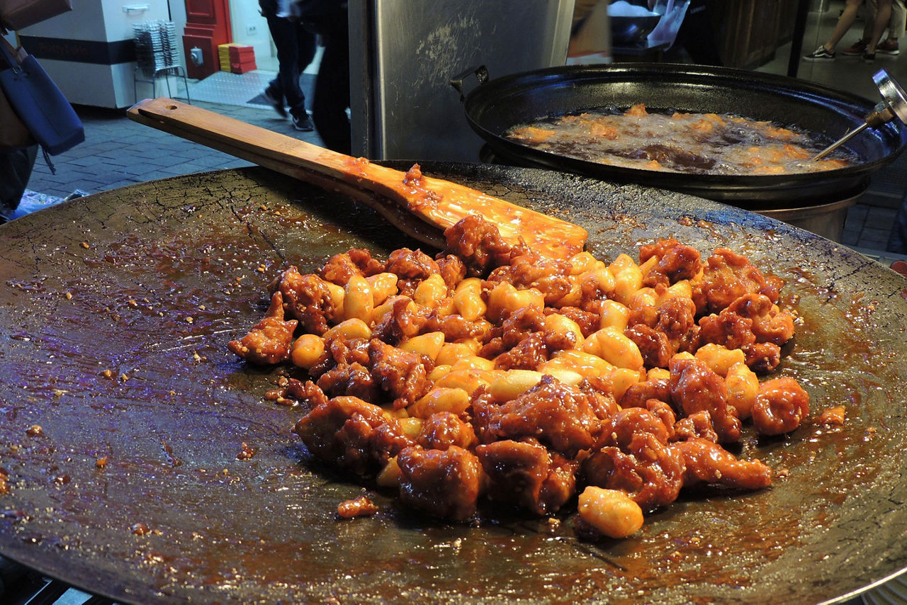 Sweet Crispy Chicken Dakgangjeong street food in Seoul, South Korea