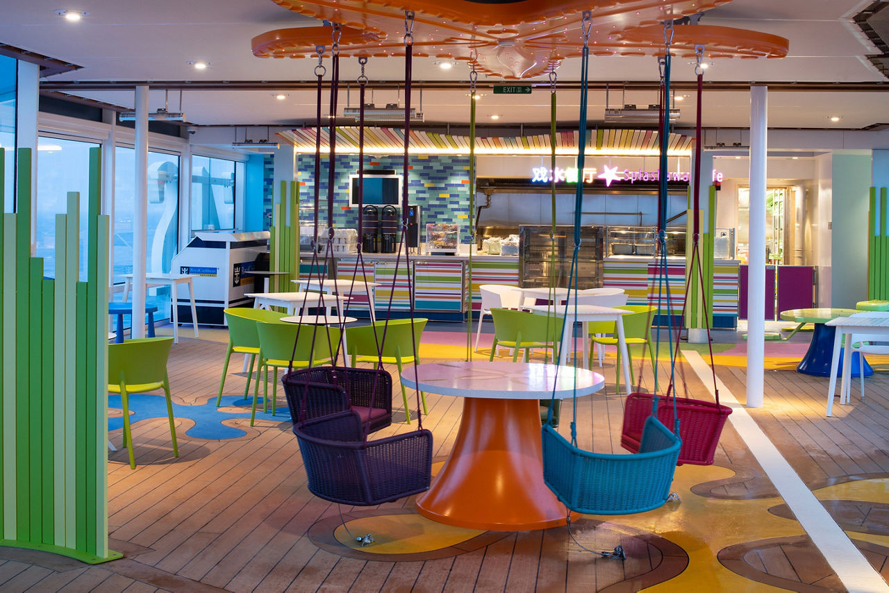 plashaway Cafe Interior with Swinging Colorful Chairs