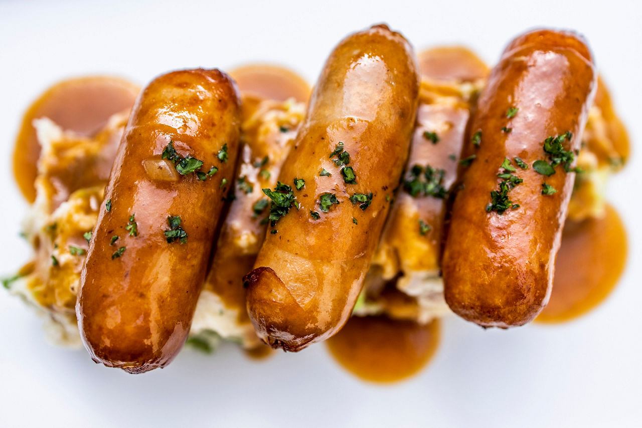 Bangers with mash and sausage gravy. Authentic British dish 