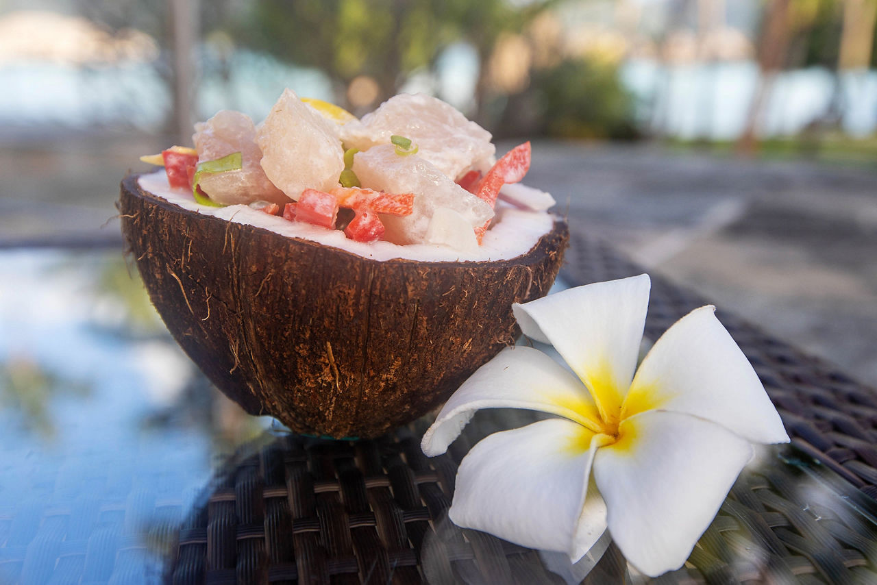 Fresh Poission Cru (raw fish) in a coconut shell.