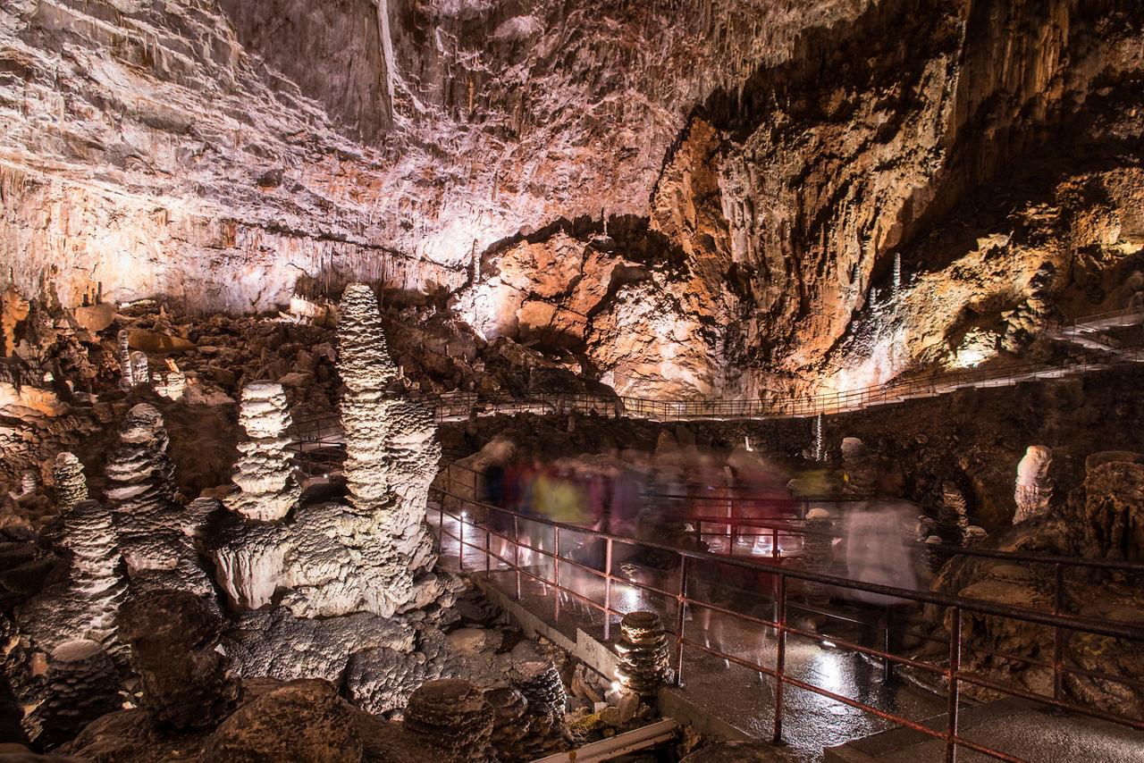 Tourists in Grotta Gigante - the biggest cave in Europe, located near Trieste, Italy