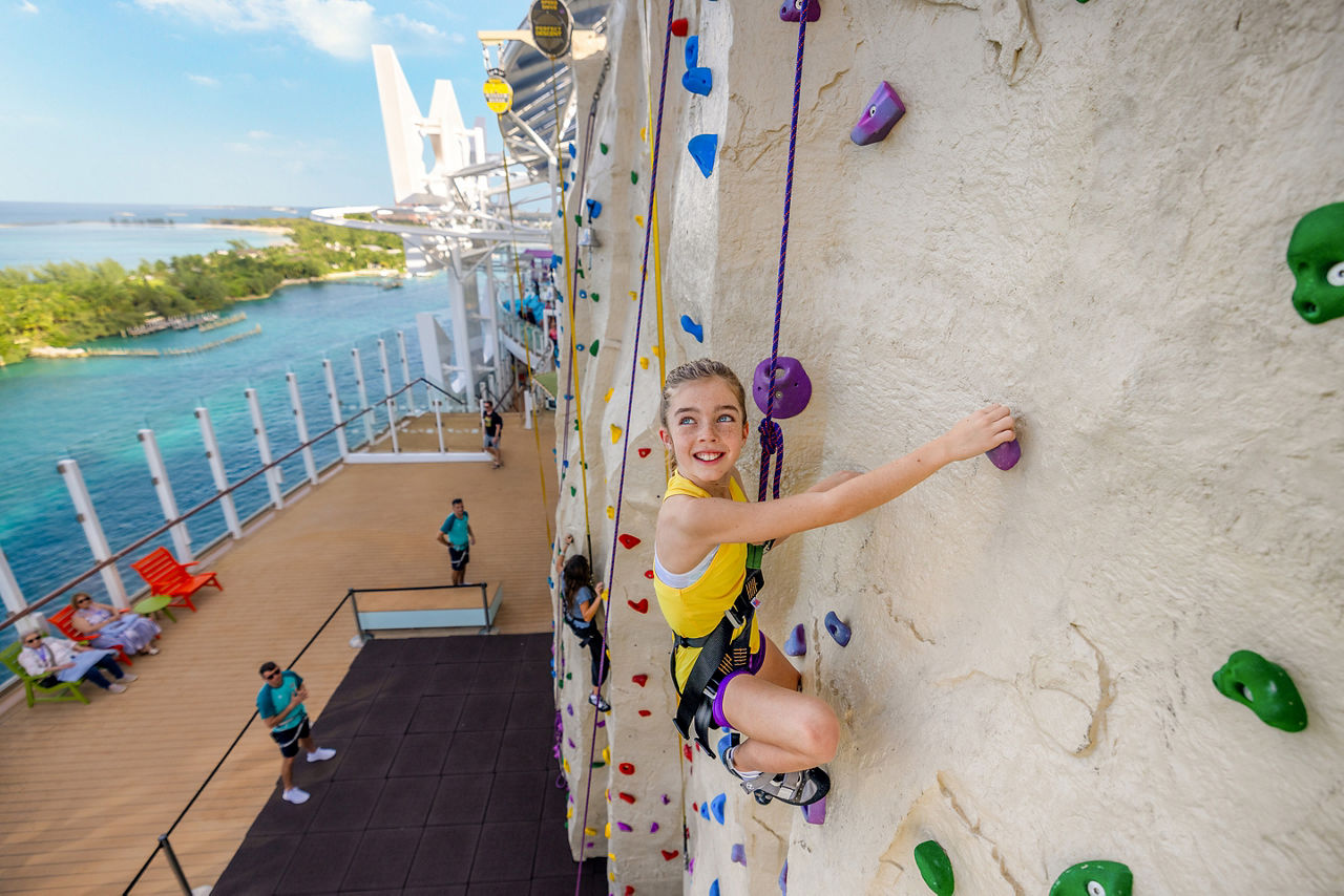 Girl Rock Climbing Adrenaline Peak 