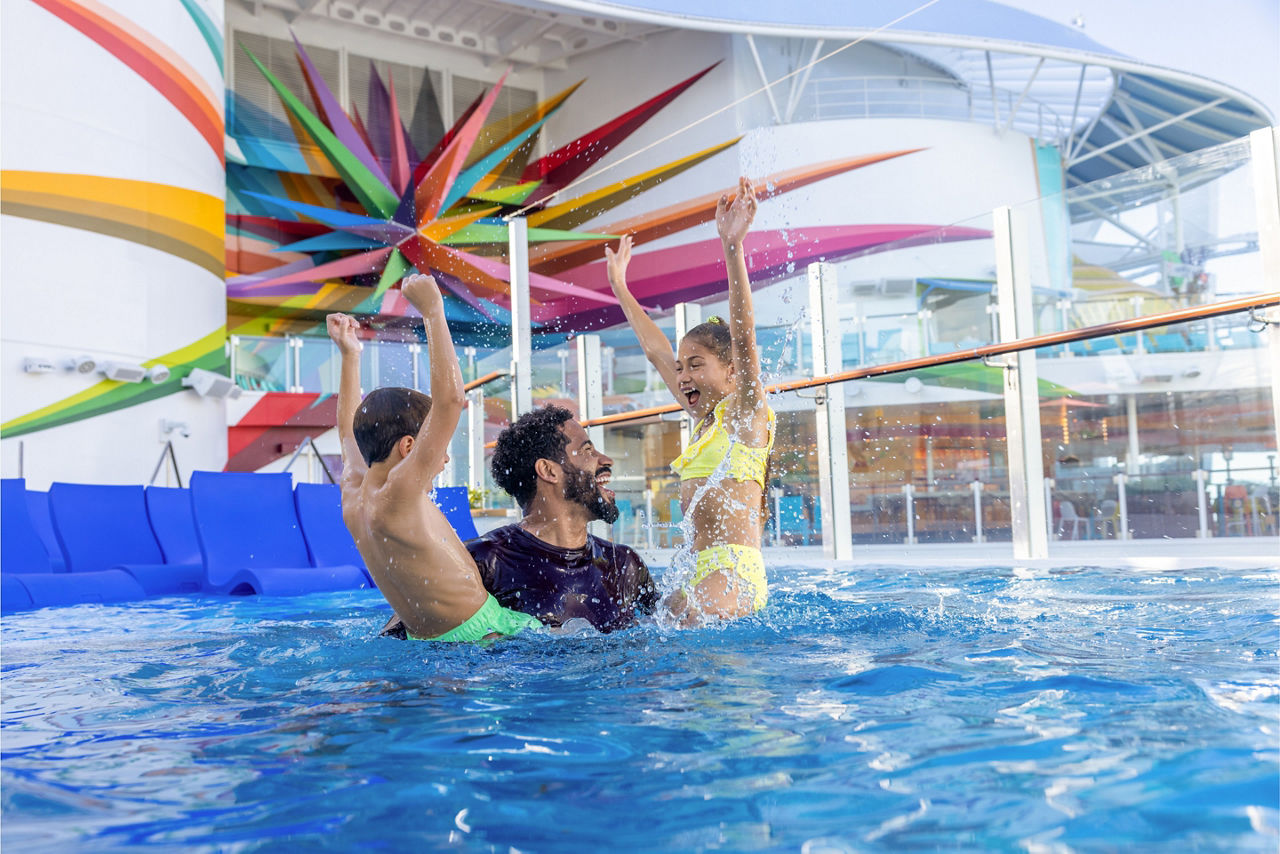 star of the seas royal bay pool father with children splashing